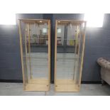 Pair of glass double door display cabinets