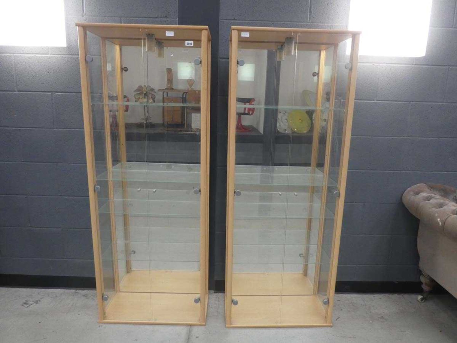 Pair of glass double door display cabinets