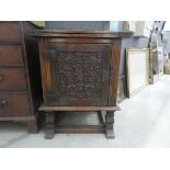 Oak single door cabinet with fold-over top