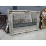 Large rectangular bevelled mirror in silver painted frame