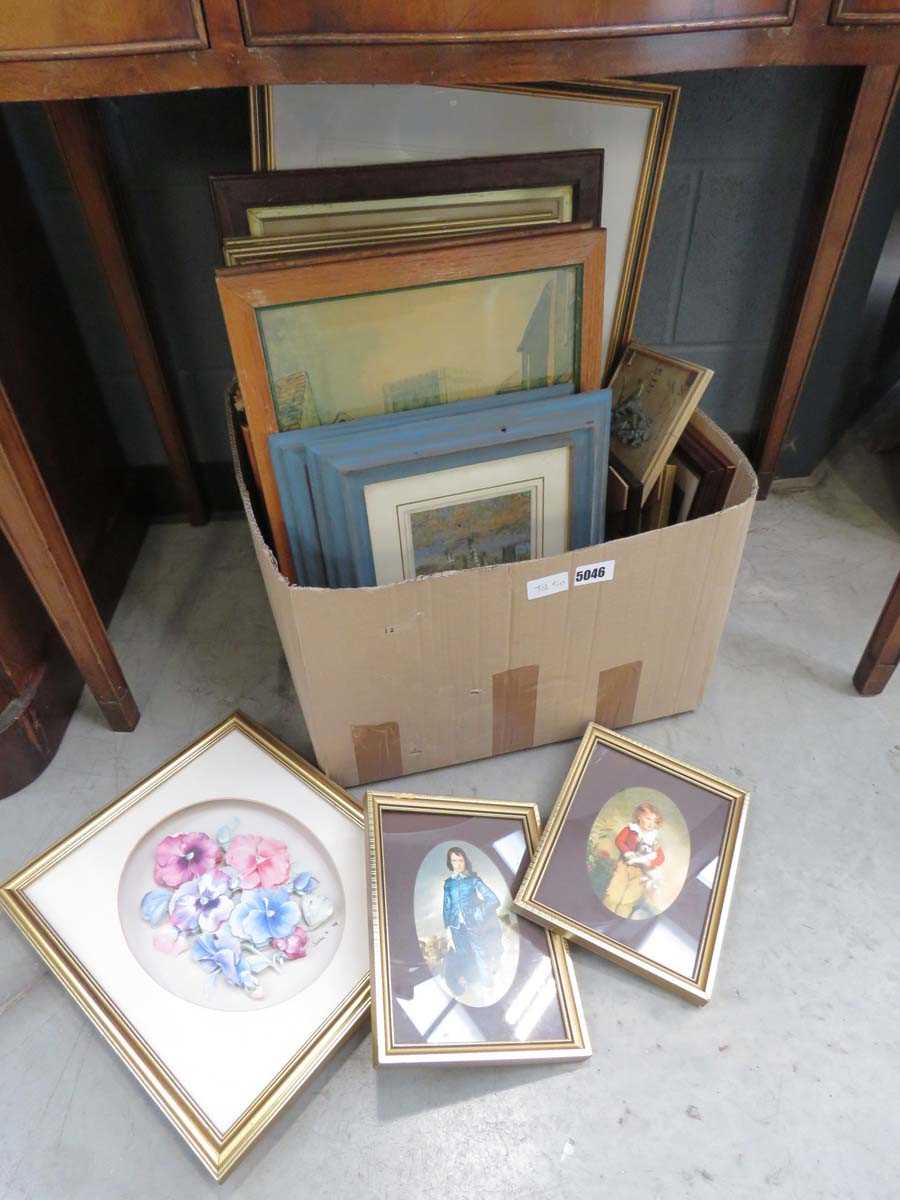 Box containing a quantity of prints to include cityscapes, coastal scenes, still life with flowers