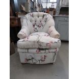 Floral upholstered armchair