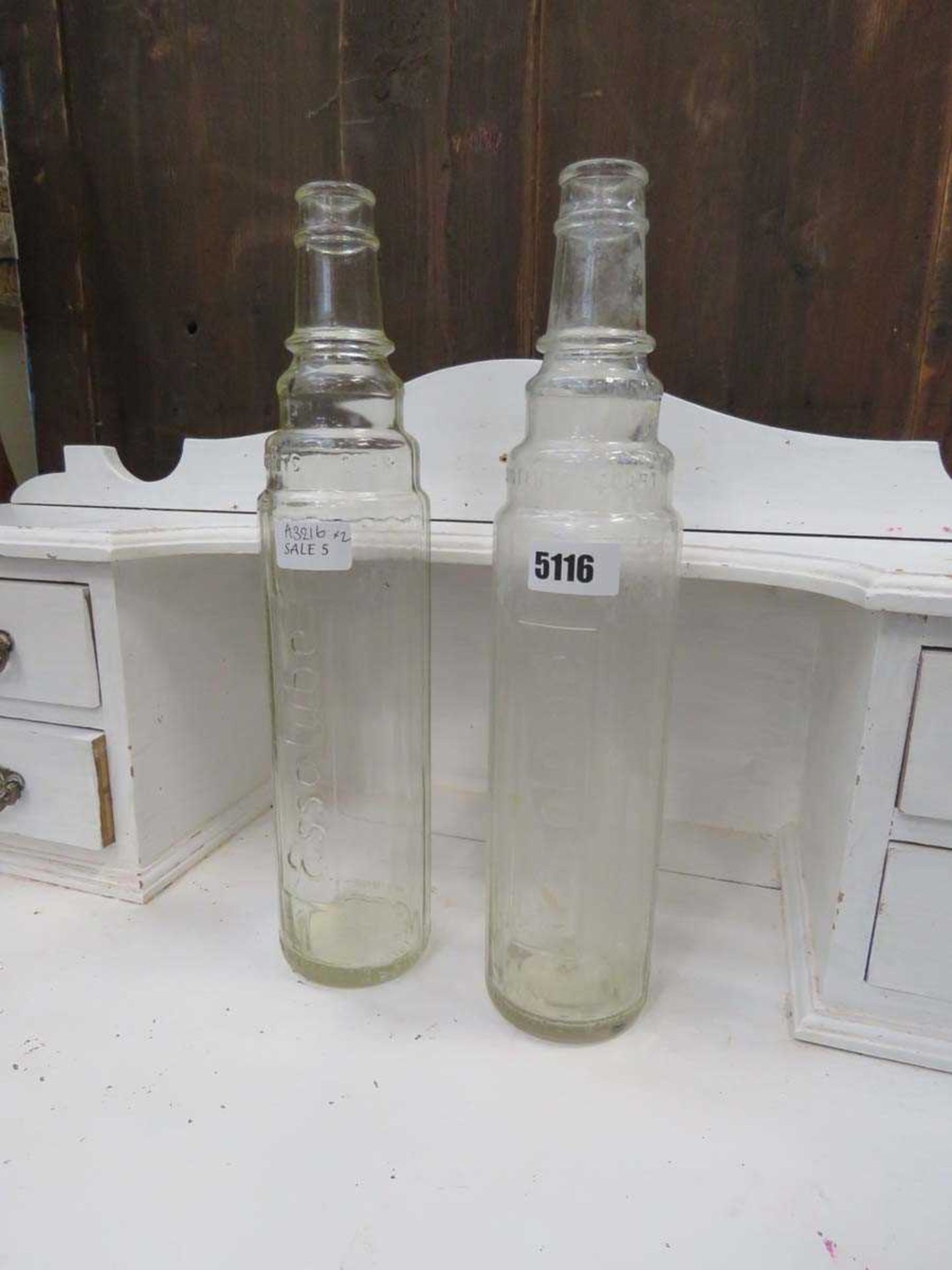 Pair of Essolube bottles