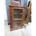 Inlaid walnut music cabinet with single glazed door