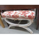 Cream painted X shaped stool with floral fabric seat