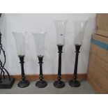 2 pairs of black painted metal candle sticks
