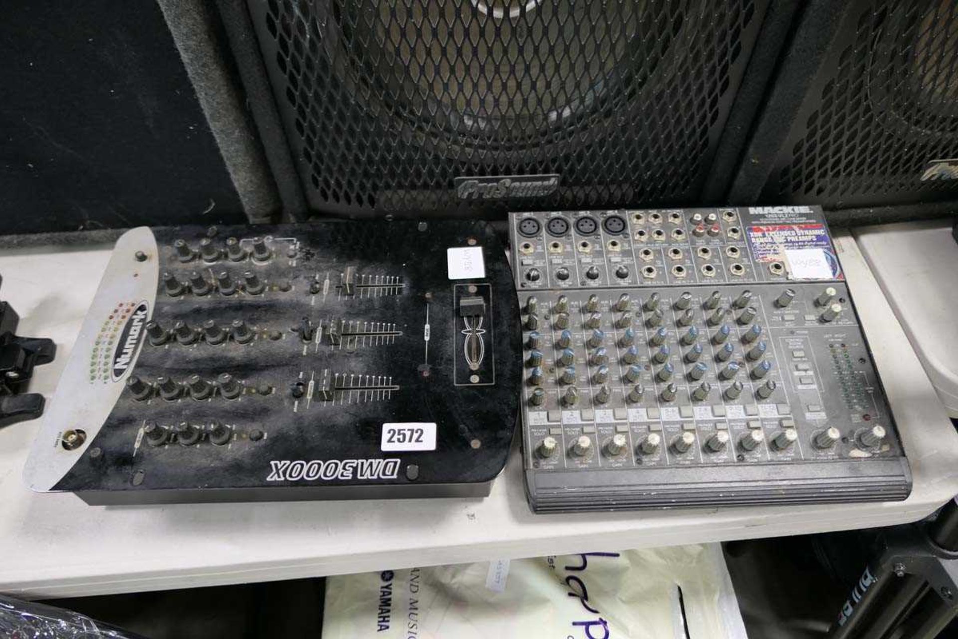 Newmark DM3000X mixer together with a Macky 1202 VLZ pro mixer