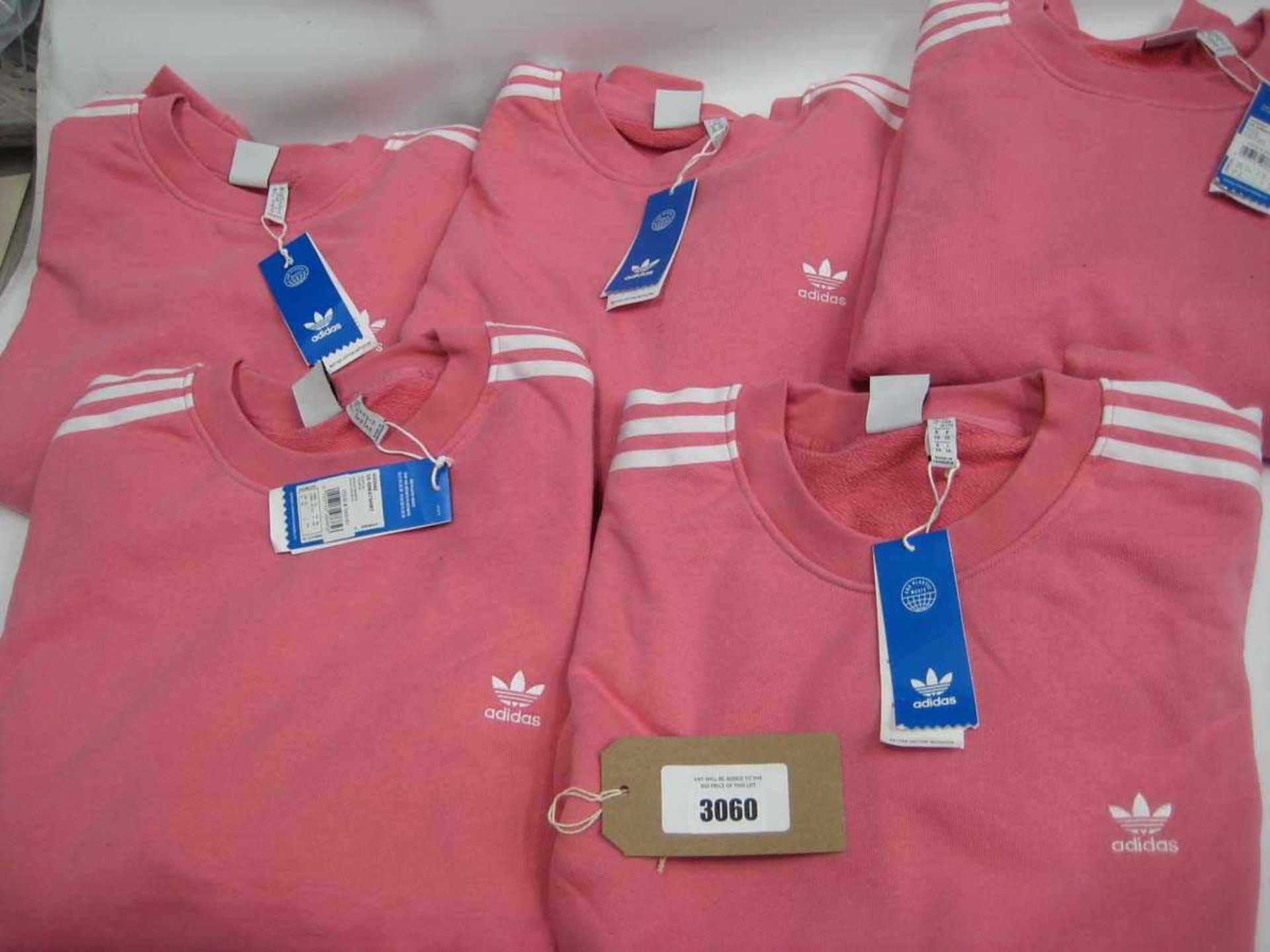 +VAT A bag containing 5 Ladies Pink Adidas Sweatshirts in X Large.