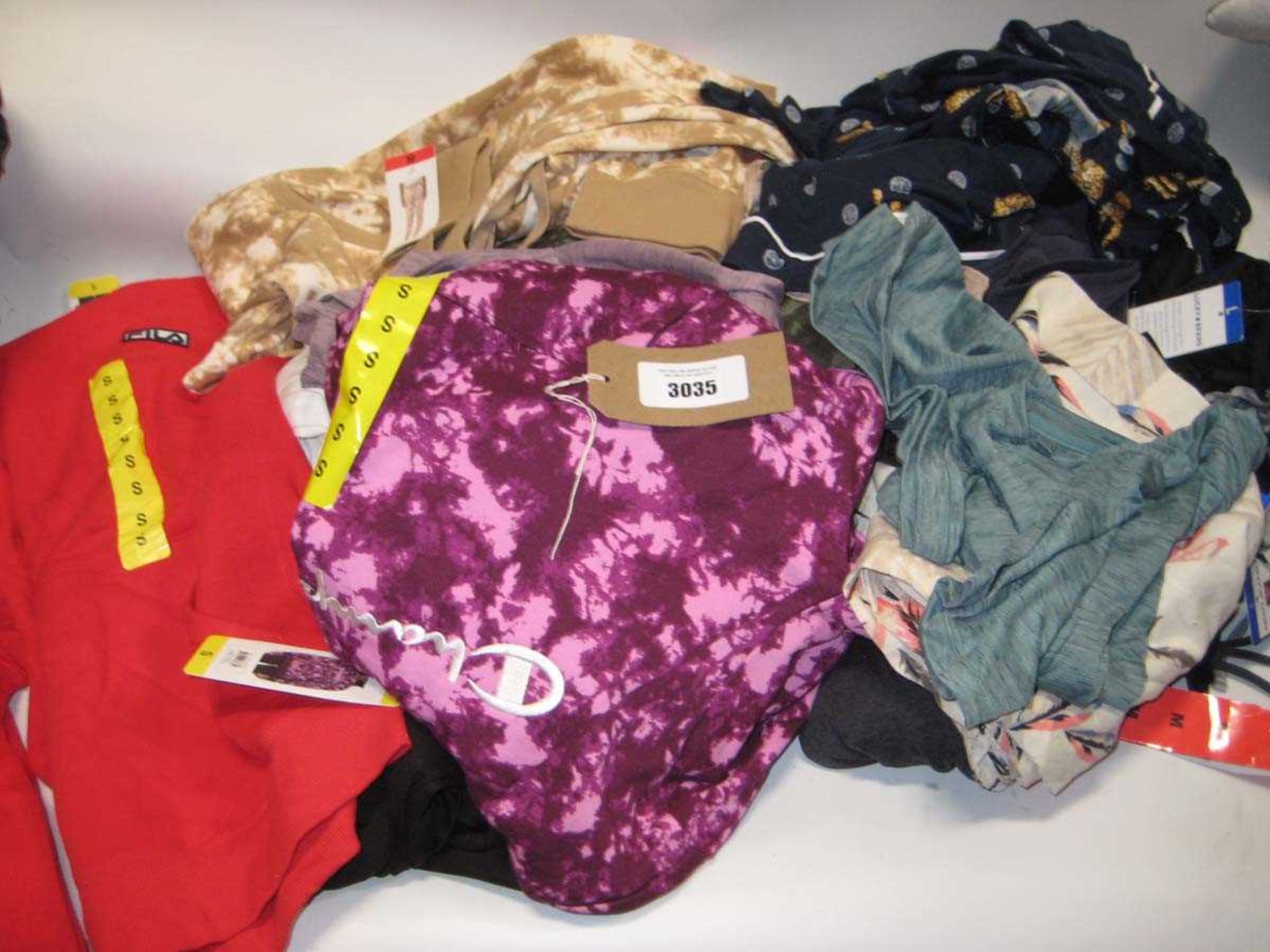 +VAT A bag containing Ladies Clothing and Loungewear in various sizes, including DKNY, Champion