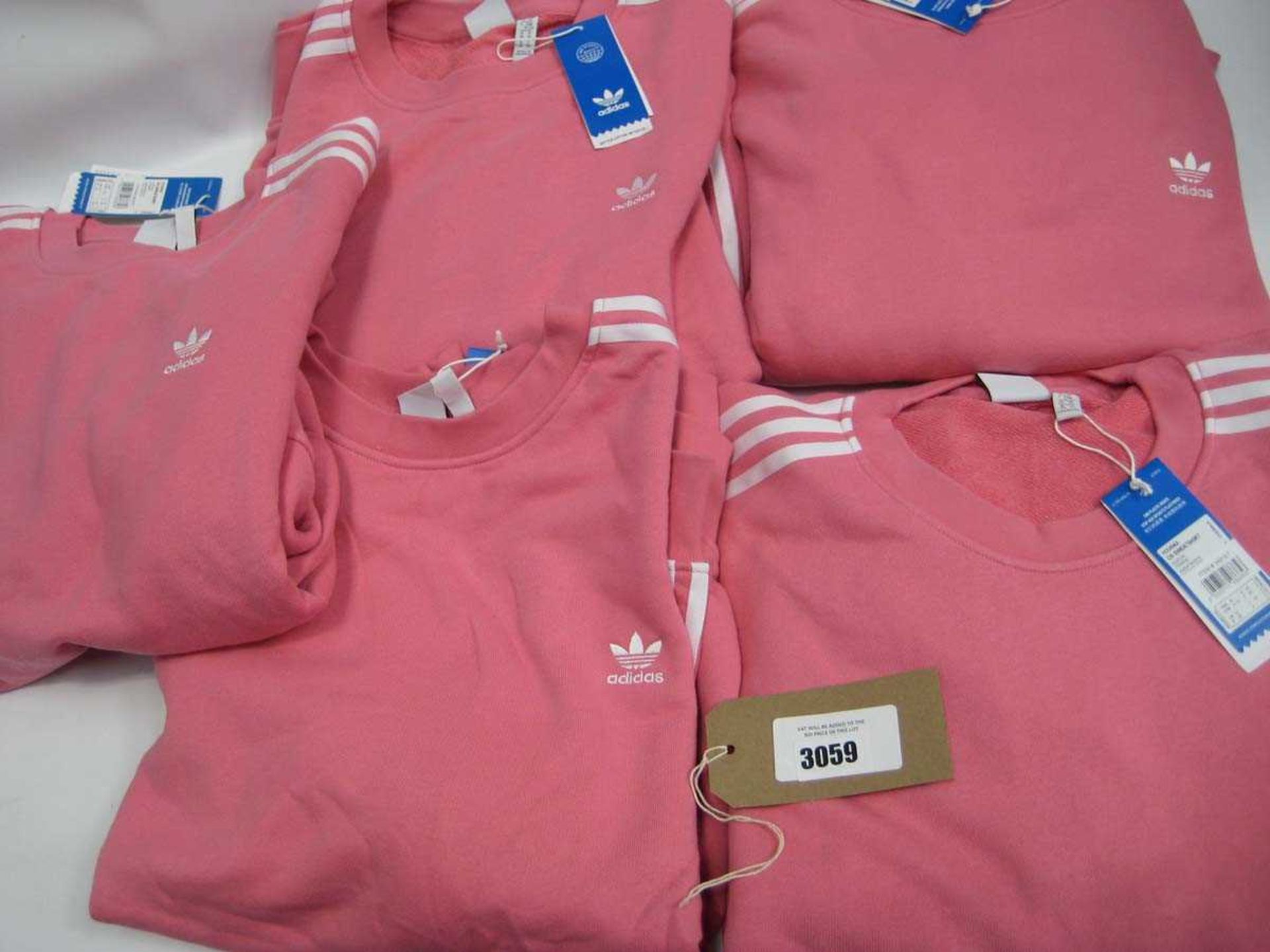 +VAT A bag containing 5 Ladies Pink Adidas Sweatshirts in Large and X Large.