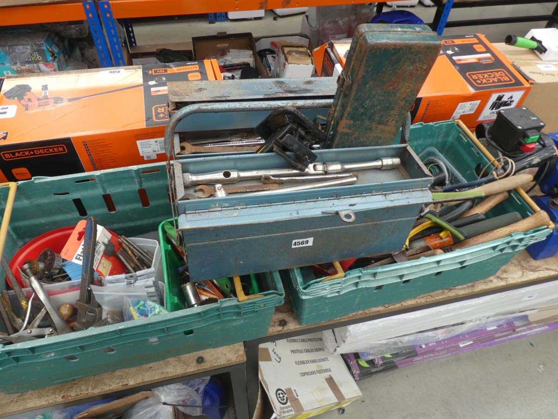 Two plastic crates and a cantilever tool box containing various tools to include clamps, drill bits,