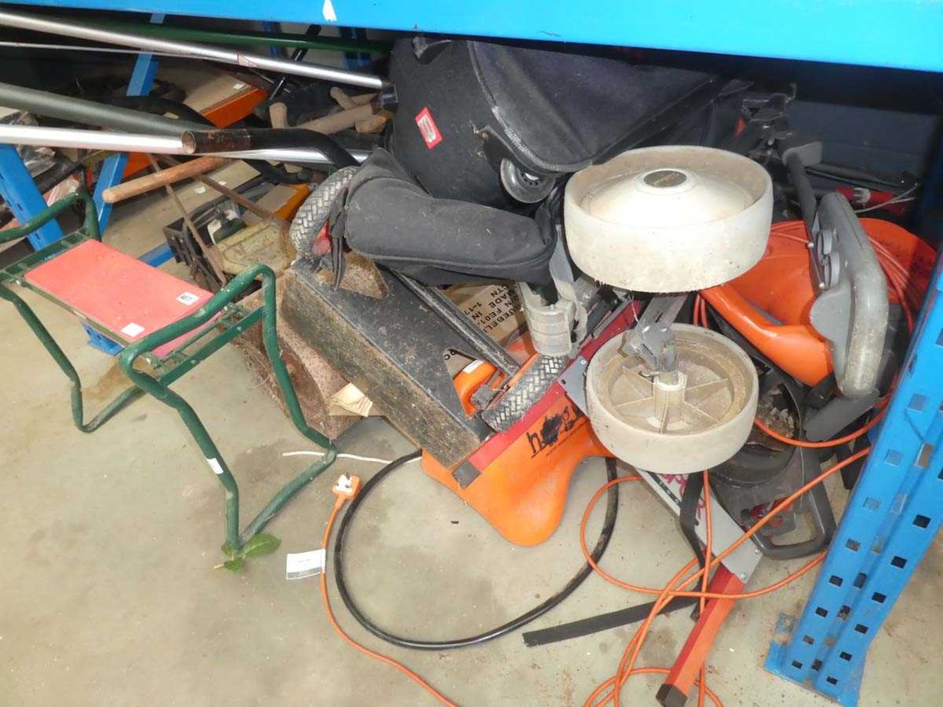 Large underbay of sack barrow, roller, golf trolleys, wheelbarrow and tools