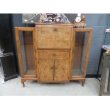 1950's walnut full front bureau with glazed doors to the side