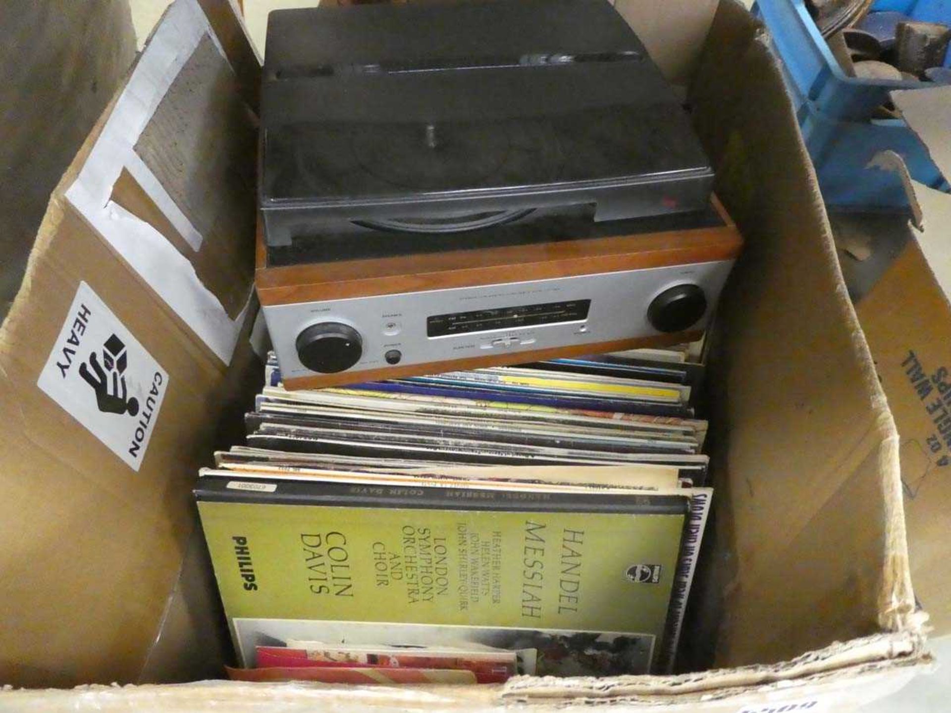 Box containing turntable and quantity of vinyl records