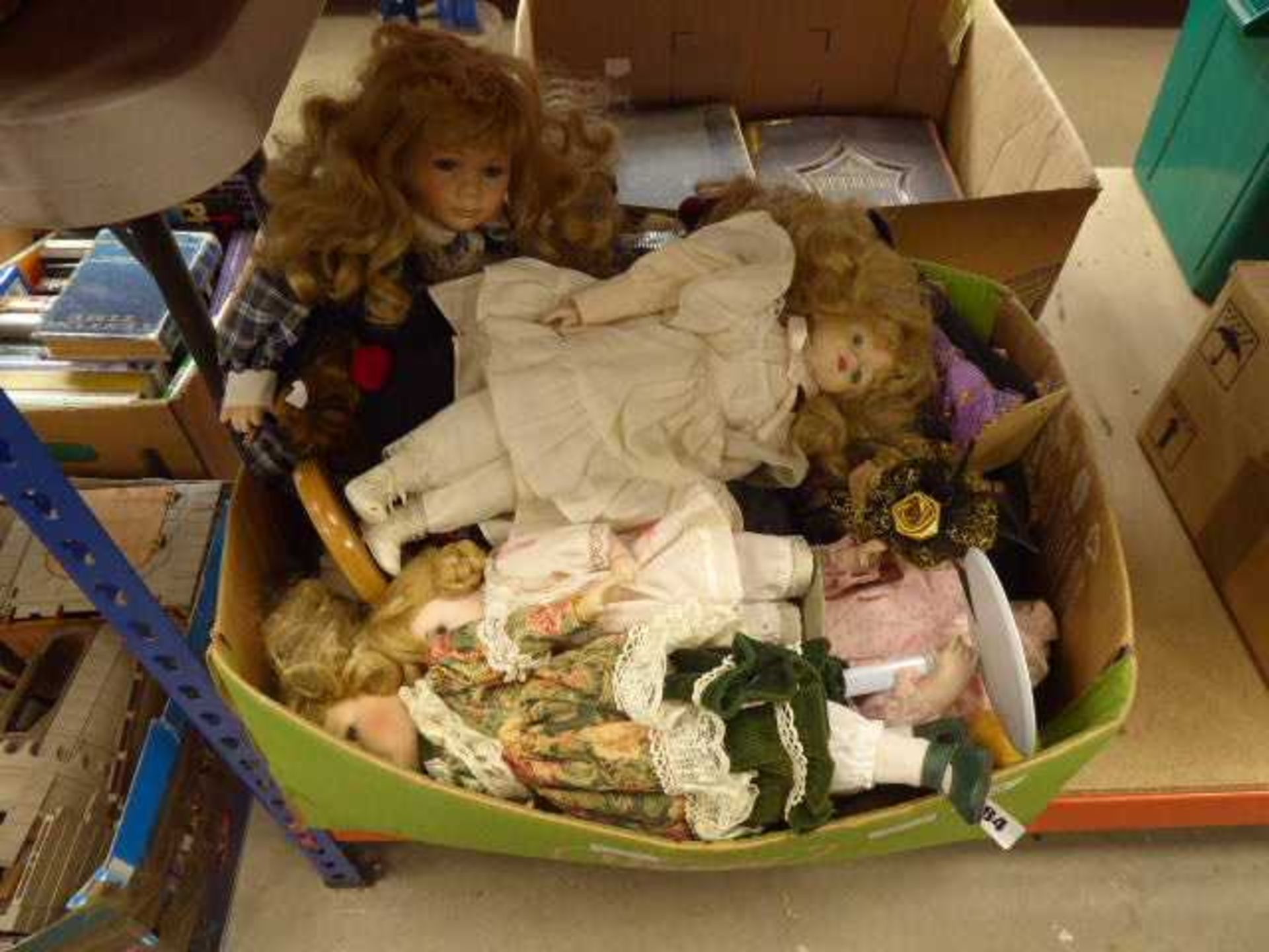 Box containing dolls