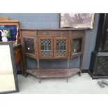 Display unit with canted sides, glazed and leaded doors