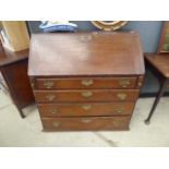 Georgian oak bureau with 4 drawers under