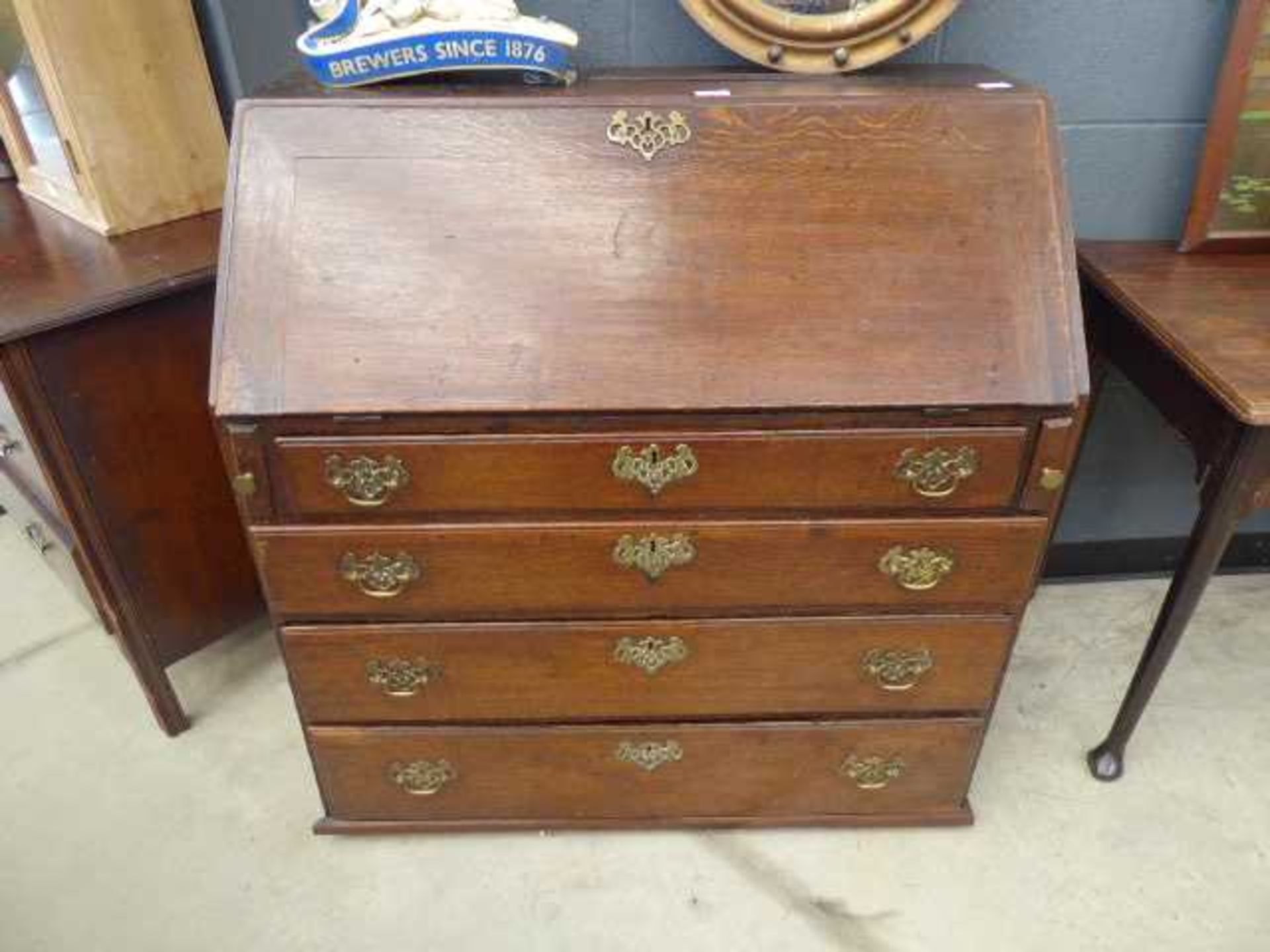 Georgian oak bureau with 4 drawers under