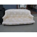Cream floral patterned sofa