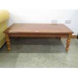 Walnut effect coffee table with rope twist finish
