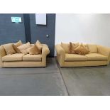 Pair of Multiyork three and two seater sofas in pale gold with scatter cushions