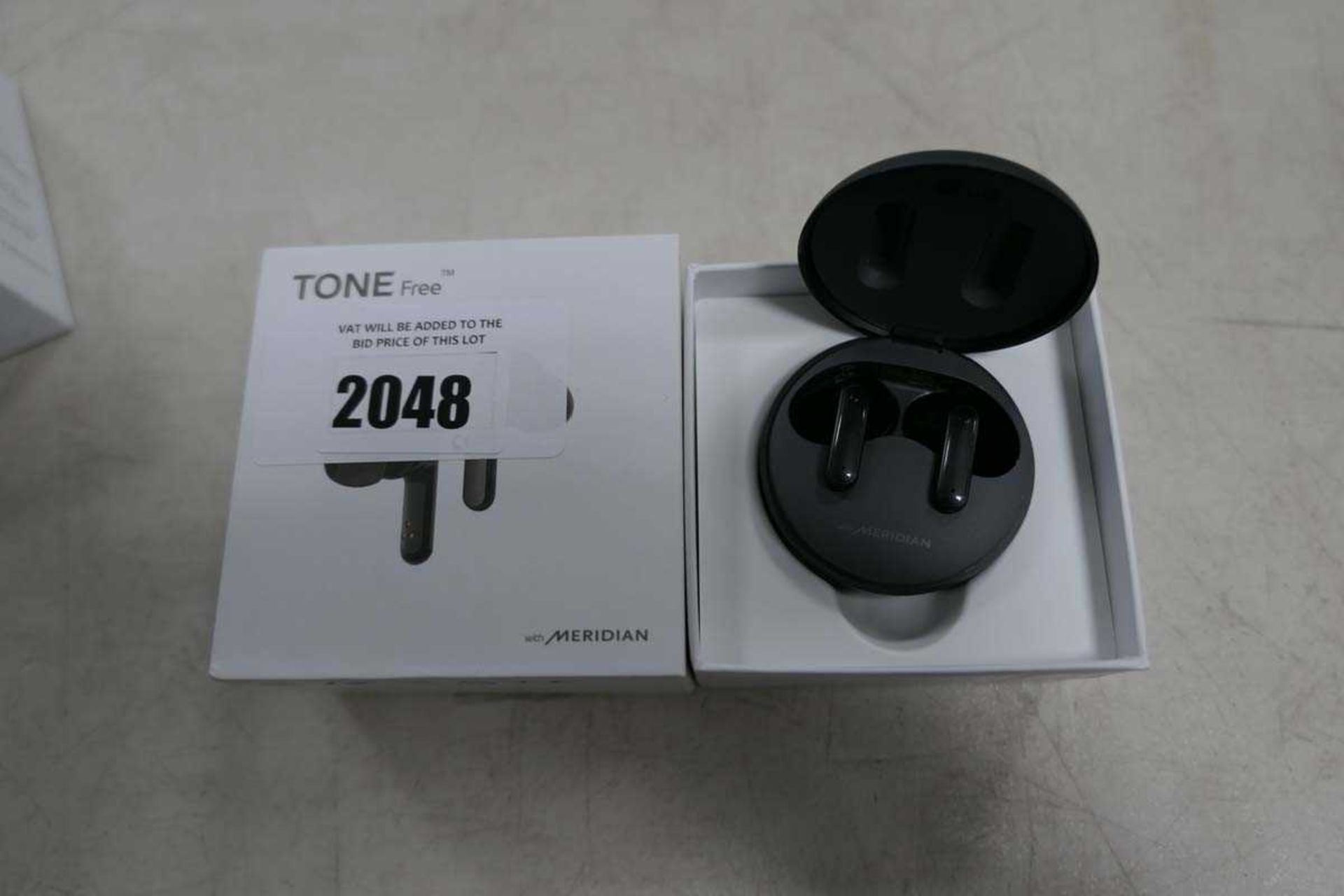 +VAT LG ToneFree wireless earbuds with charging case in box