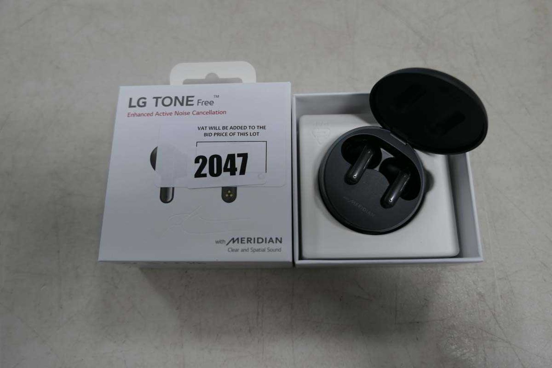 +VAT LG ToneFree wireless earbuds with charging case in box