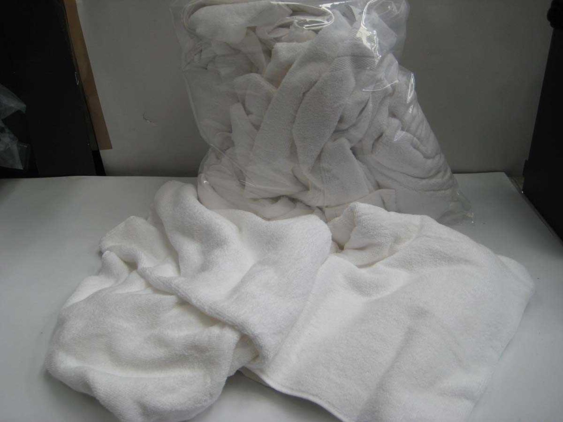 +VAT A bag containing various sizes White Towels.