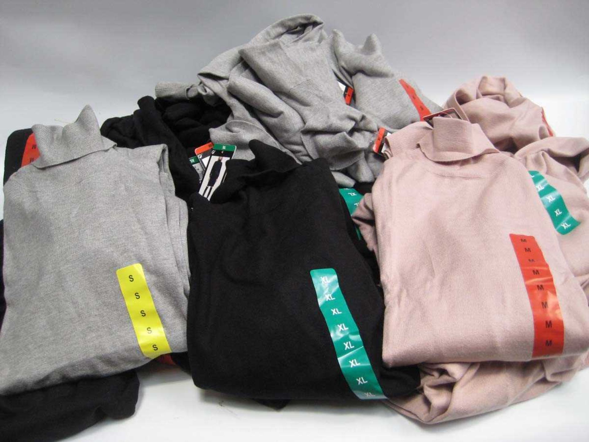 +VAT A bag containing a large quantity of Ladies Jumper Dresses in Black, Grey & Pink in various