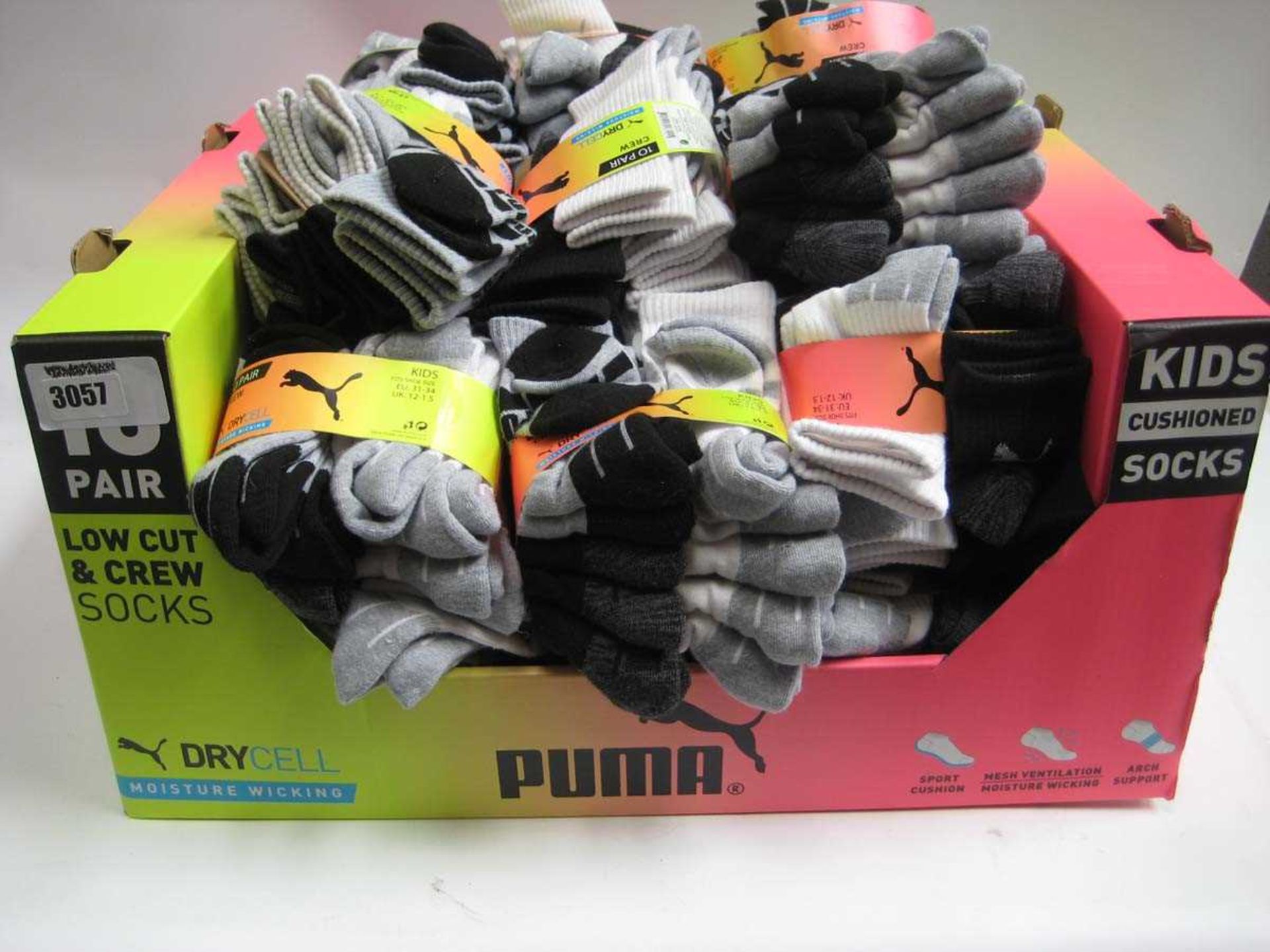 A box containing Kids & Youth Puma Socks in various sizes.