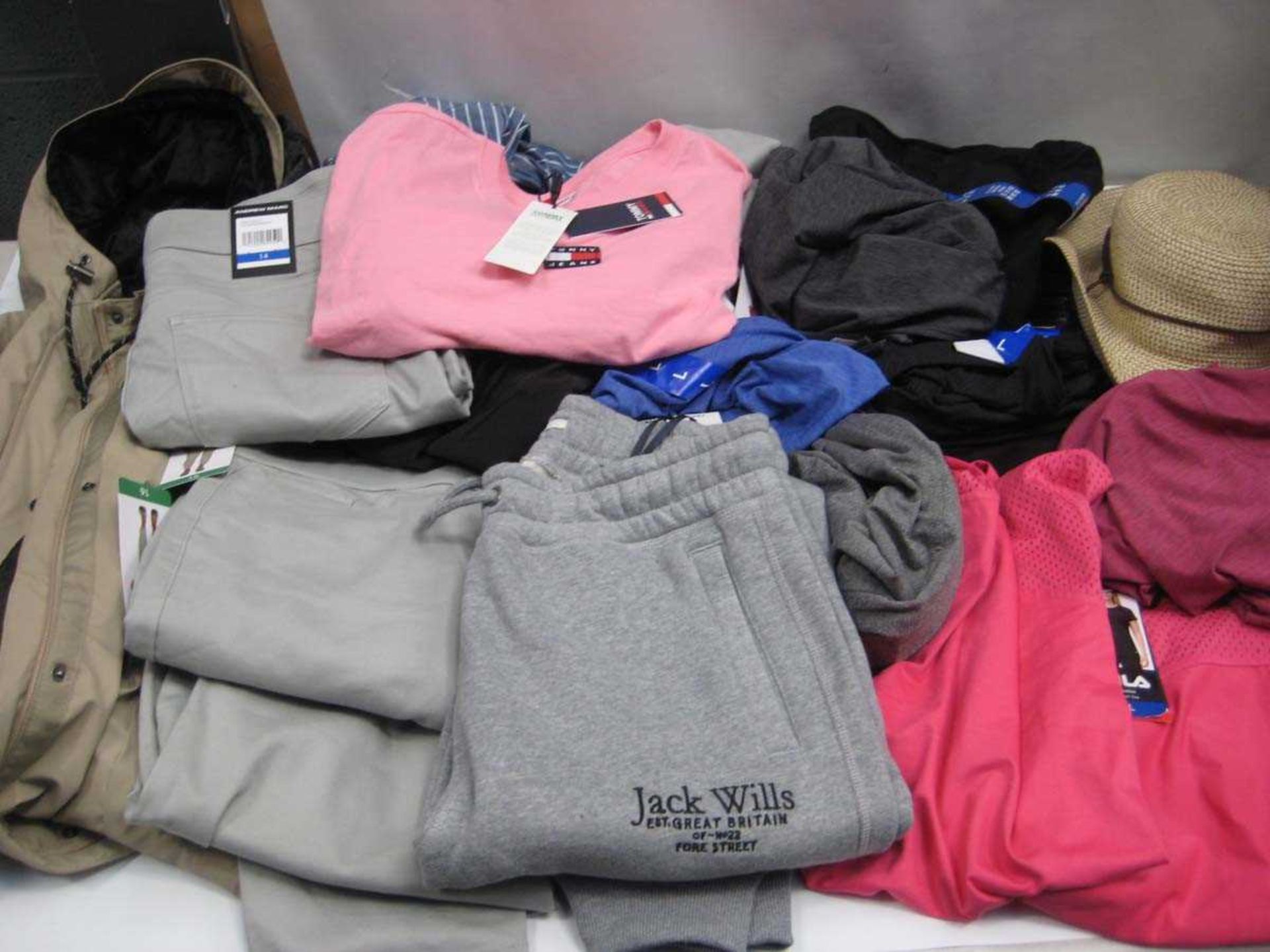 +VAT A bag containing Ladies Clothing in various sizes, including Fila, Jack Wills, Tommy Jeans.