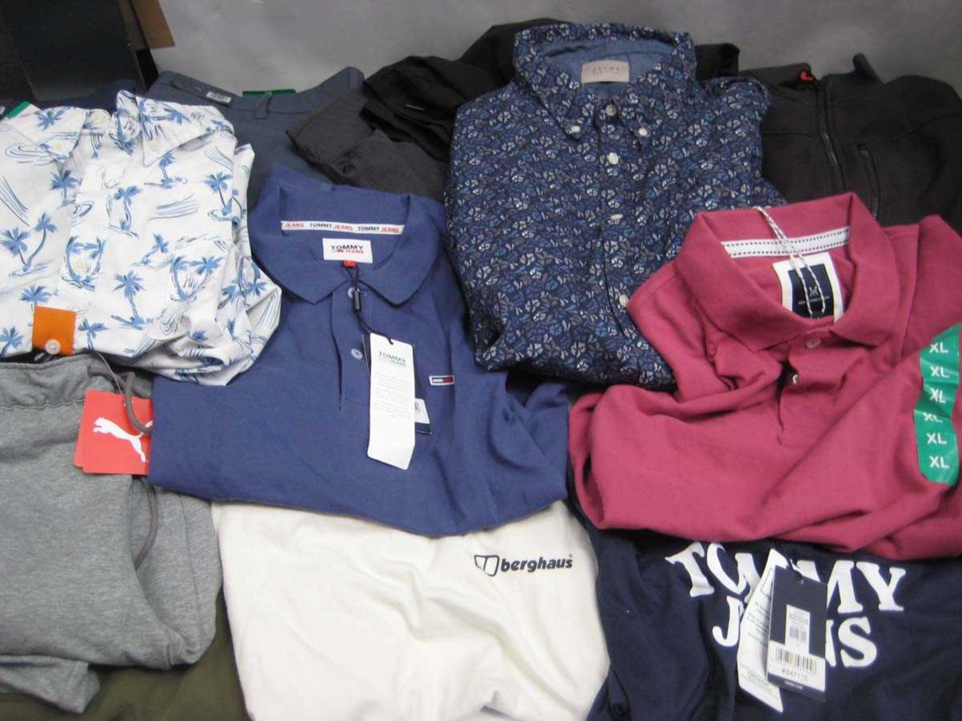 +VAT A bag containing Men's Clothing in various sizes, including Crew Clothing, Tommy Jeans, Puma,