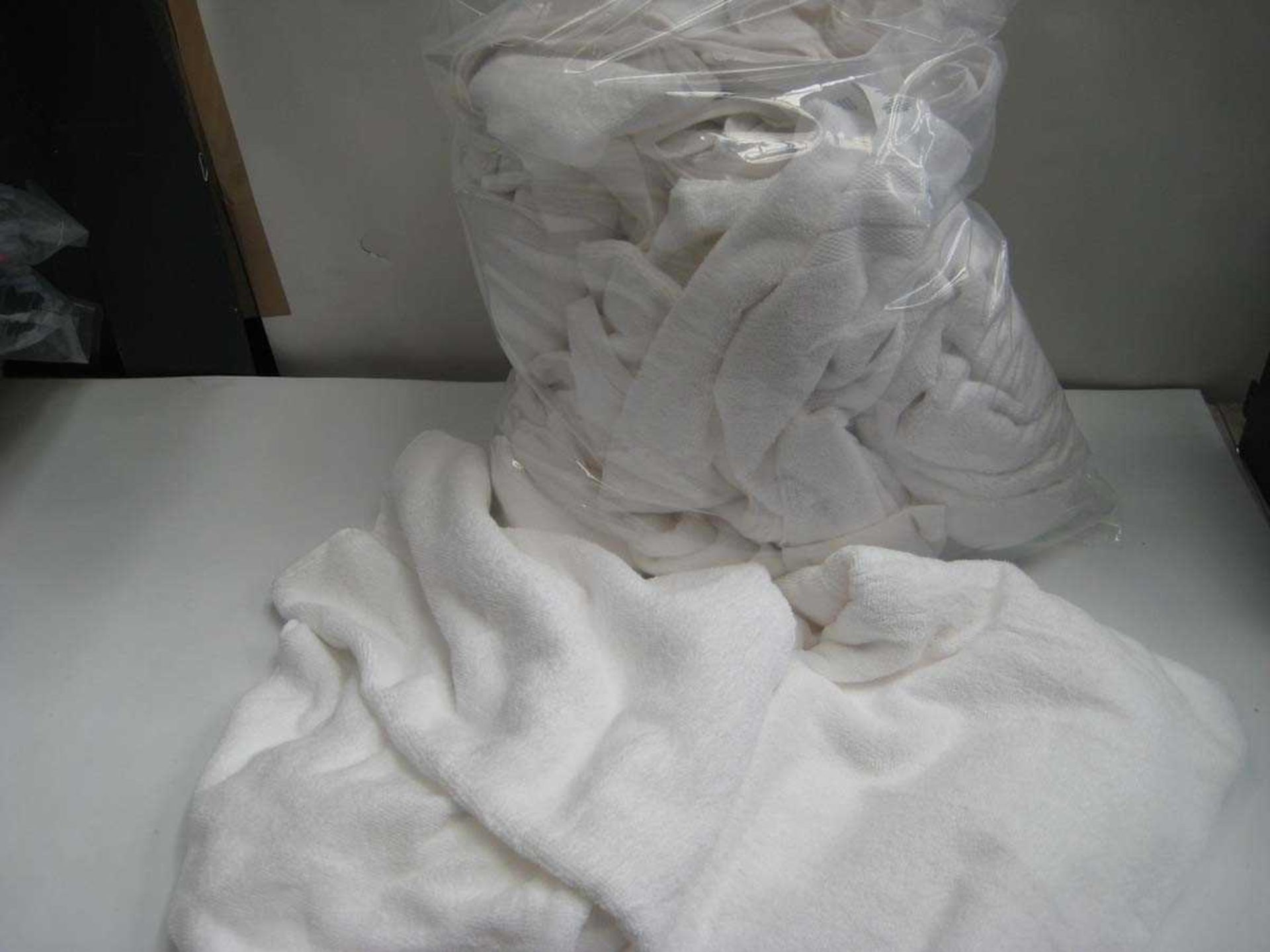 +VAT A bag containing various sizes White Towels.