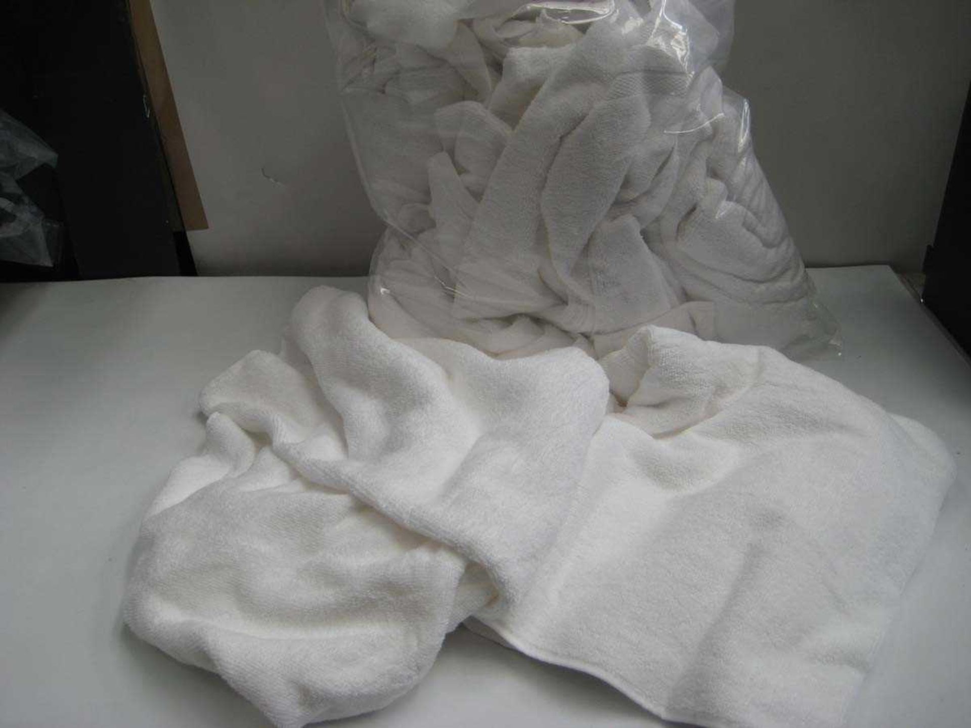 +VAT A bag containing various sizes White Towels.