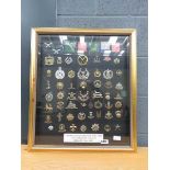 Wall plaque with cap badges