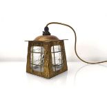 An Arts & Crafts hammered brass hanging lantern, later converted to electricity, h. 18 cm