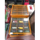 9 die cast toy display cabinets plus small quantity of toys