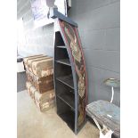 Boat shaped open bookcase