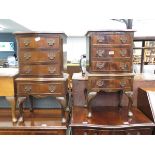 Pair of reproduction serpentine fronted 4 drawer chests