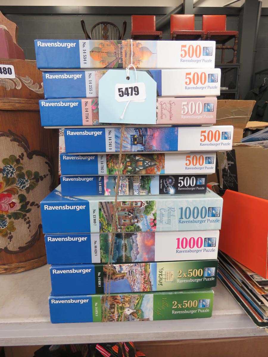 Stack of Ravensburger jigsaw puzzles