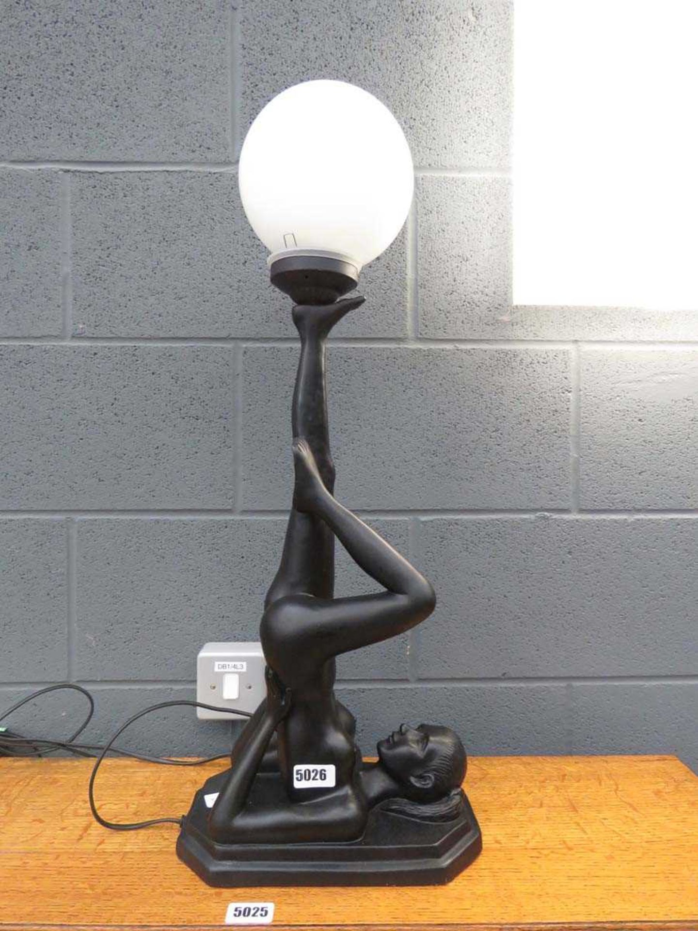 Table lamp with figure of a nude to the column