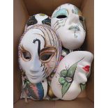 Box containing miniature masks