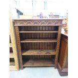 Oak open bookcase with carved panels