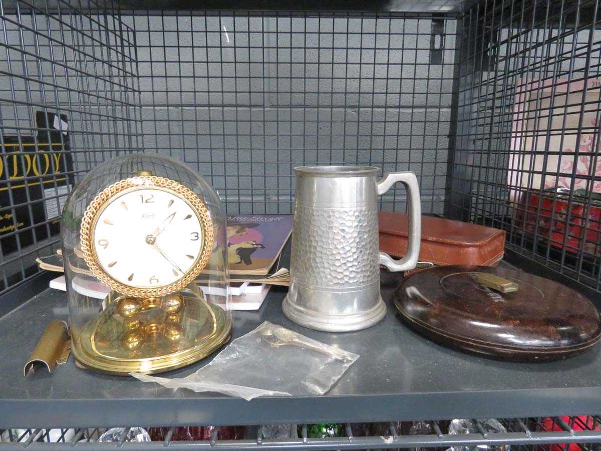 Cage containing anniversary clock, grooming kit, tape measure, mustard spoons, ephemera and beer