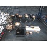 Cage containing silver plated goblets, teapot, wristwatch and brooches