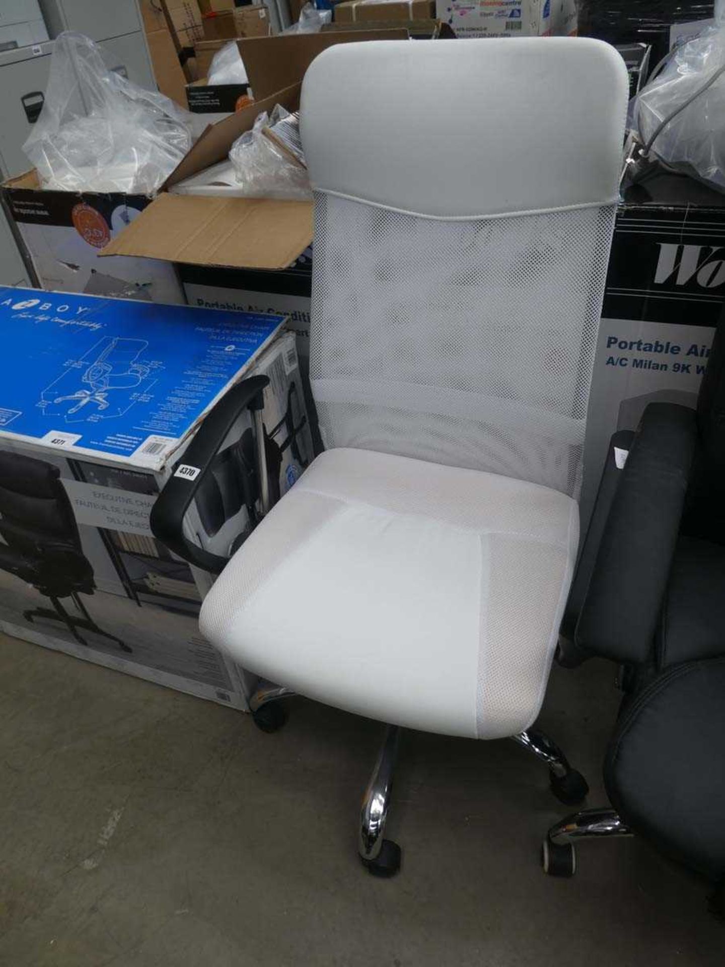 White high back swivel armchair