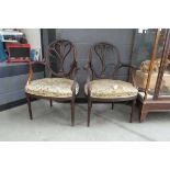 For Restoration: pair of ornate mahogany framed armchairs with floral upholstered seats, stamped