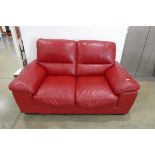 Red leather upholstered lounge suite comprising a three seater and two seater sofa