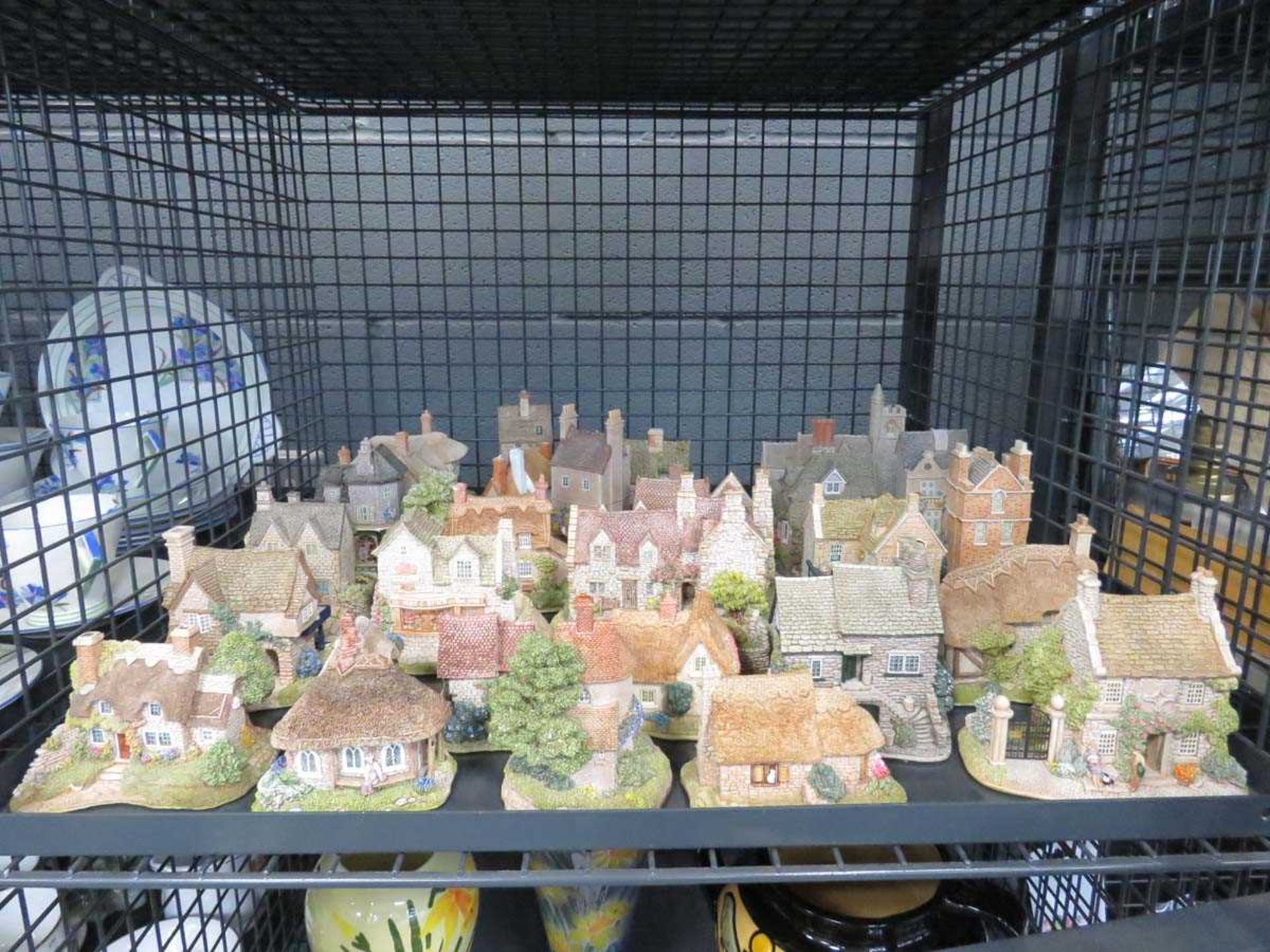 Cage containing a quantity of Lilliput Lane and other cottages