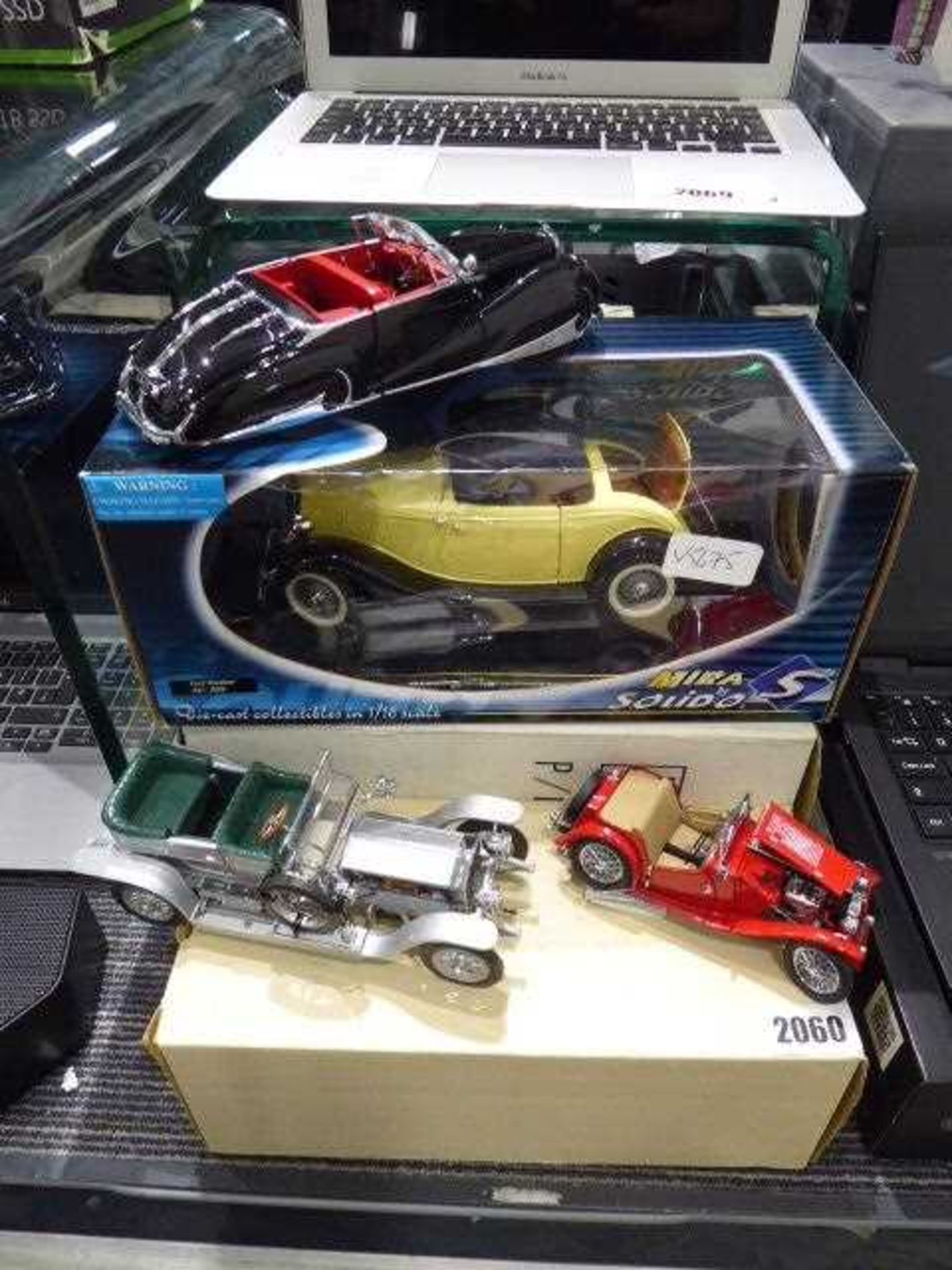 Various die cast collectible modelss to include 1:18 model die cast vehicles